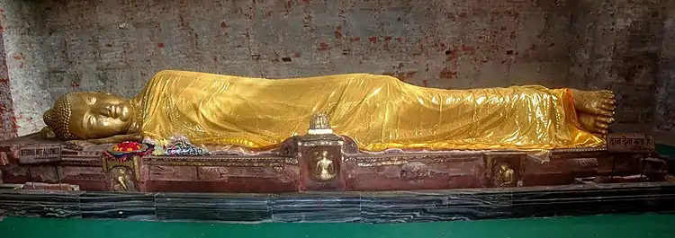 The ancient excavated Buddha inside the Parinirvana Temple, Kushinagar.