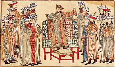 Sultan Mahmud of Ghazni receiving a richly decorated robe of honor from the caliph al-Qadir in 1000. Miniature from the Rashid al-Din's Jami‘ al-Tawarikh