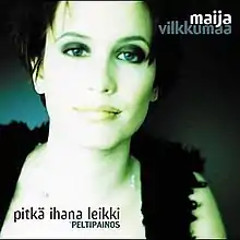 The cover artwork shows an obscure picture of the face and the upper chest of a woman. the picture is overexposed in a greenish, white light.