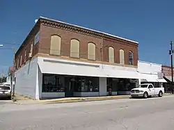 Main Street (a.k.a. "Shopping Center 9") and First Avenue