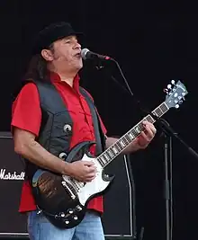 McNulty performing with Slade in 2011