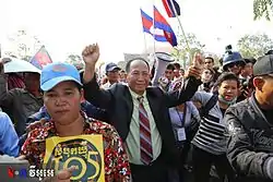 Beehive Radio journalist Mam Sonando leads a demonstration at the Ministry of Information, in January 2014.