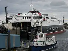 Manannan on the Victoria Pier with the Laxey Towing Company's Karina on the cruise ship landing stage in the foreground.