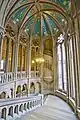 The principal staircase with a spiral staircase projecting into it