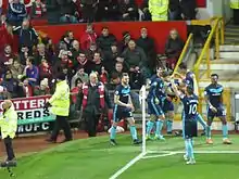 Middlesbrough celebrate taking the lead at Old Trafford; Manchester United would win the match in December 2016 2–1