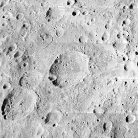 Lunar Orbiter 2 image.  Mandelʹshtam A is in the center of Mandelʹshtam, and Mandelʹshtam R is similar in size to A and to the left, and it overlies the smaller Mandelʹshtam T.