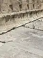 Marble seats at the Theatre of Dionysus inscribed with names.