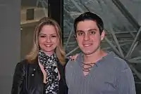 Maria Cecília & Rodolfo during a news conference.