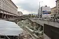 Maria Luiza Boulevard with St Nedelya Church and Sheraton Sofia Hotel Balkan in front, and  TZUM on the Left, and current archaeological excavations along the street