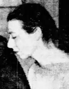 A young white woman in profile