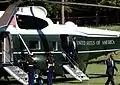 Mosteller departs Marine One behind President Obama.