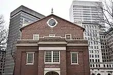 View of the building's eastern facade, Downtown Providence is visible in the background