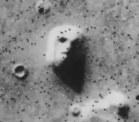 "Face on Mars" – due to Sun's lighting (Viking 1 orbiter; July 25, 1976)(40°45′N 9°28′W﻿ / ﻿40.75°N 9.46°W﻿ / 40.75; -9.46).