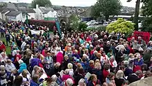 Singers gather for the massed sing at the Street Choirs Festival, Kendal, 2017