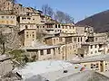 The yard of the above building is the roof of the below building