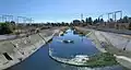 Matadero Creek at West Bayshore Road, near Highway 101 in Palo Alto, looking south. The concrete channel is very wide by then to carry large flows.