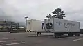 A pair of Matson-Horizon containers, aging at the Walmart plaza.