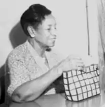 A photograph of Maude Williams taken at a state NAACP meeting in Dallas, Texas, June 1954