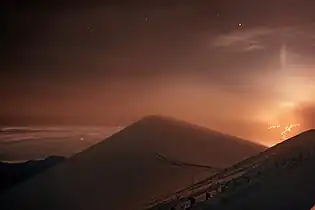 Mauna Loa lava flows and a light pillar seen from the Gemini North Observatory