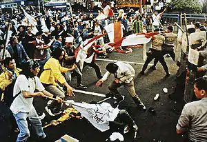 Image 99University students and police forces clash in May 1998 (from History of Indonesia)