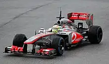 Sergio Pérez testing the McLaren MP4-28 in Montmelo (2013).