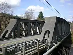 SR 162 crosses the Puyallup River northwest of Orting on the McMillin Bridge opened in 1934