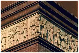 Corner figures, exterior frieze