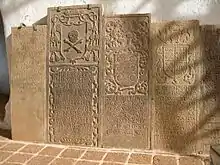 Gravestone (second from the left), in Malacca's St. Paul's Church, of Peter Martinez consecrated as the second bishop of Japan in Goa, 1595 and arrived in Nagasaki, 1596. He left in 1597 following the deaths of the 26 Martyrs of Japan. Died en route to Goa in February 1598.