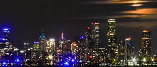 Australia 108 (centre-right) along Melbourne's skyline in January 2022