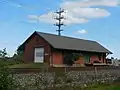 The adjacent freight house, built in 1909 to replace the one destroyed in the 1905 wreck of the 20th Century Limited.