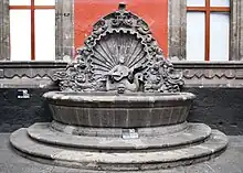 Fountain depicting a mermaid playing a guitar, located in the Museum of the City of Mexico (17th century)