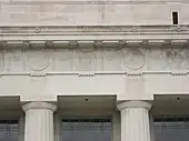 Early 20th-century Americanized metopes, using bison in place of cow skulls (bucranium)