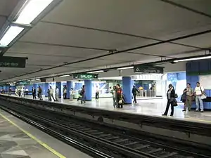 Picture of a platform, where some people stands.