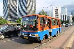 A MetroMini bus on Sudirman avenue