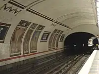 The opposite platform can be seen through the tunnel