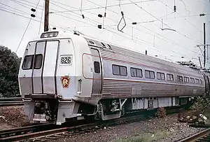 Silver tubular railcar with enclosed front end