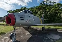 An F-86, a single-seat jet aircraft, on the ground