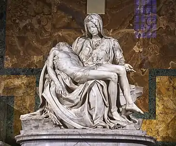 This marble statue shows the Virgin Mary seated, mourning over the lifeless body of Jesus which is supported across her knees.