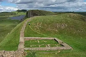 Image 31A segment of the ruins of Hadrian's Wall in northern England, overlooking Crag Lough (from Roman Empire)