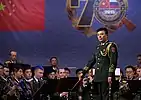 The Director of the PLA Band, Colonel Zhang Haifeng conducting members of the PLA Band and the Band of the WMD.