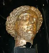 Gold coloured statue head