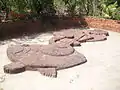 Laterite sculpture of the poet, St. Mirabai at the Big foot museum.