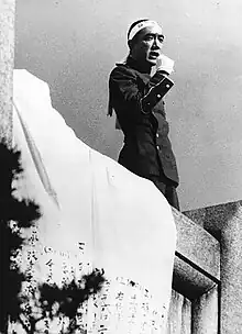 Author Yukio Mishima wearing a hachimaki moments before his death.