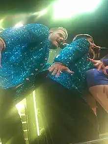 Mitch Grassi and Scott Hoying singing onstage as Superfruit.