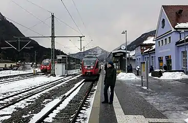 Mittenwald station, looking south (towards Austria). An ÖBB train to Innsbruck at platform 1 on the right, and a DB train to Munich at platform 3 on the left