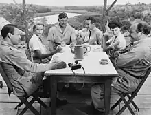 Mogambo (1953) cast with (L-R) Donald Sinden, Grace Kelly, Clark Gable, Denis O'Dea, Gardner and Philip Stainton