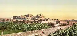 Photograph of the ruins of Mohamedia, Tunisia. This color photochrome print was made in 1899 in Tunis, Tunisia.