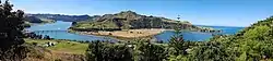 Mōkau panorama: river, SH3 bridge, beach - and Mt. Taranaki far away (82km = 51mi) in the background