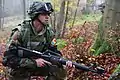 Image 5A soldier from Moldova pulls security while conducting a company situational training exercise during exercise Combined Resolve III at the Joint Multinational Readiness Center in Hohenfels, Germany, Oct. 26, 2014