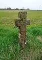 A Latin wayside cross in Roussard sandstone.